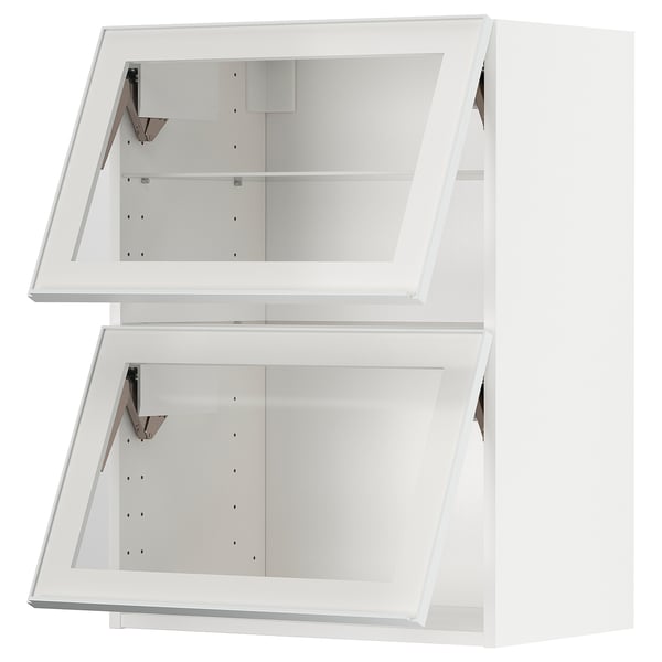 A white METOD kitchen cabinet with glass doors and metallic frames. It a modern design with clean lines and a sleek appearance.