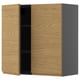 Wooden and grey kitchen cabinet with one open door, minimalist design.