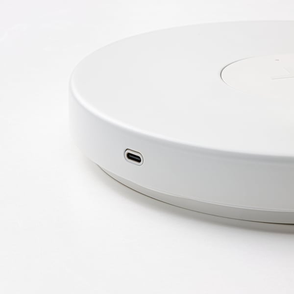 Air gap, white wireless charger. Usb-c port, sleek design.