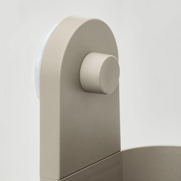 Modern wall organiser with curved design for drill-free mounting.