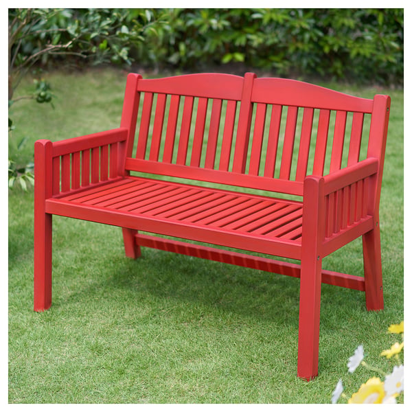 Bright red garden bench with curved back and wooden slats, perfect for outdoor relaxation.