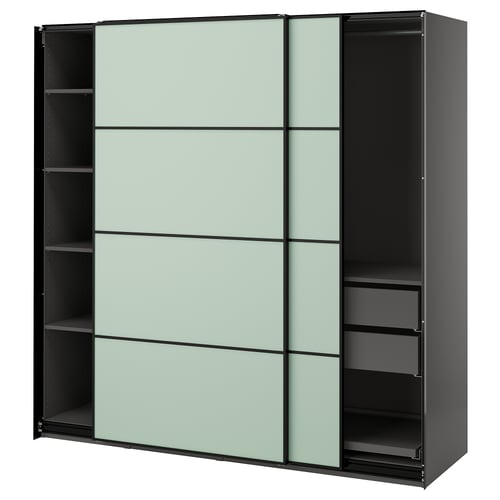 Modern, grey PAX wardrobe with green-tinted sliding doors, featuring a minimalist design and multiple shelves.