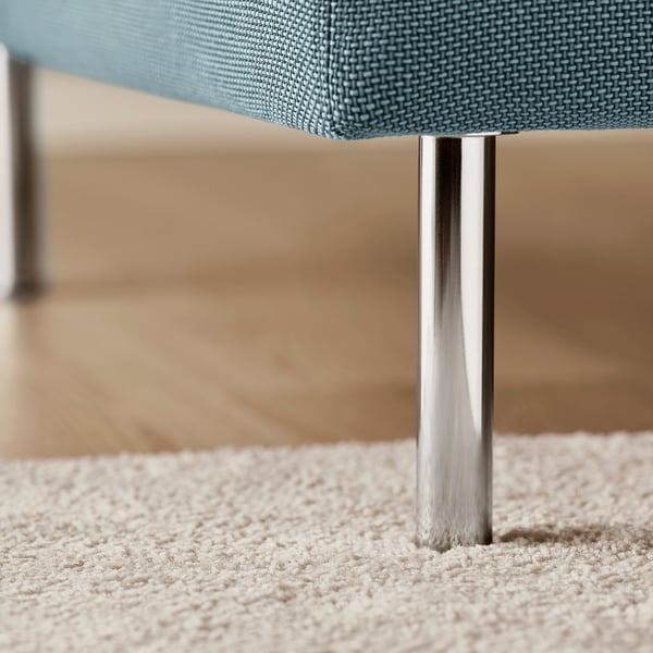 A sleek, modern chair with polished metal legs and comfortable blue upholstery.