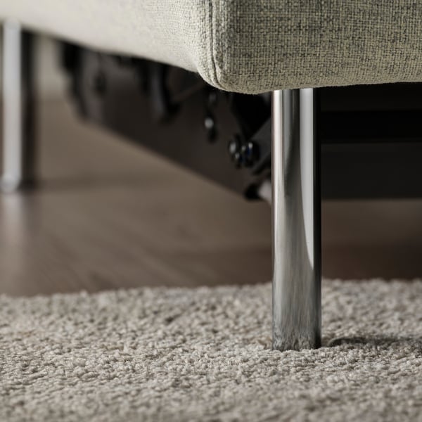 Modern sofa bed with sleek lines and sturdy metal legs, offering comfort and functionality.