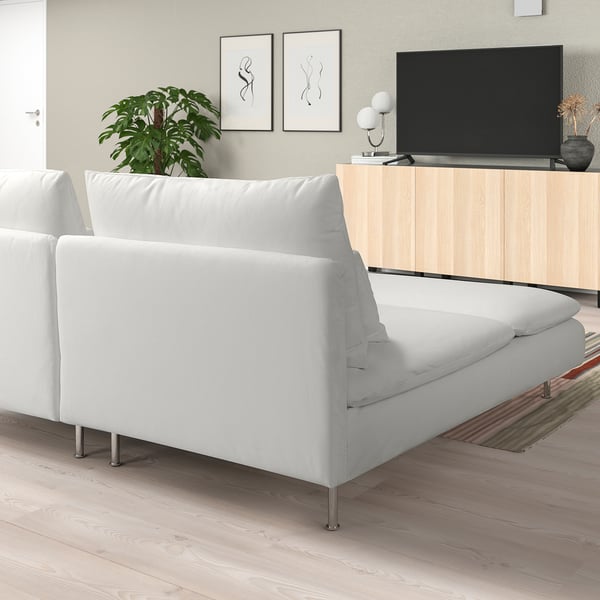 Modern living room with SÖDERHAMN couch, wooden floor, tv stand, minimalist design.