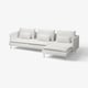 Modern white sectional sofa with deep seats, clean lines, and metal legs.