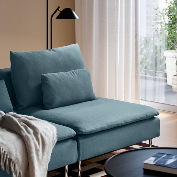 A modern living room with SÖDERHAMN chaise lounge in light blue and a black floor lamp.