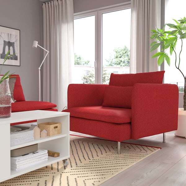 Bright red SÖDERHAMN armchair, modern & cosy, slightly larger than side table, beside window.