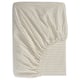 Striped gold-and-white fitted bed sheet with elastic edges.