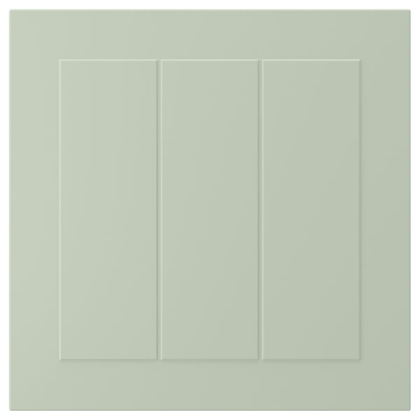 A STENSUND cabinet door in green with grooved panels and a smooth finish.