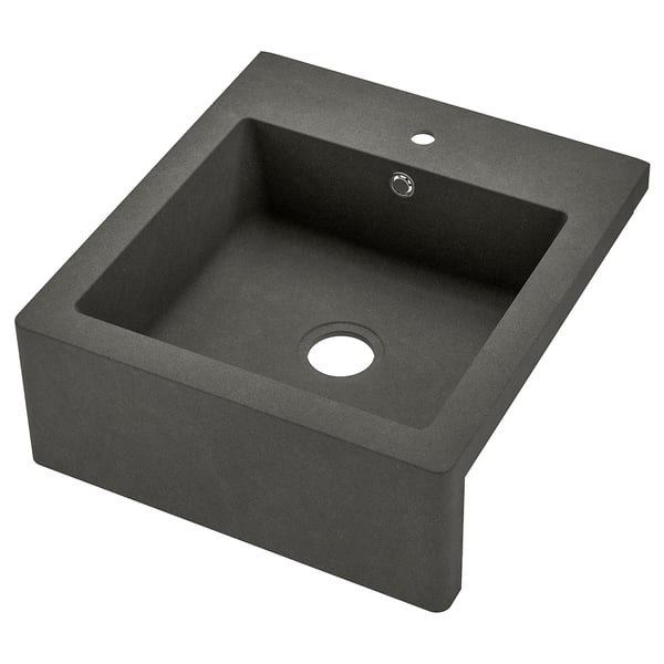 The TALLSJÖN sink is a dark grey quartz composite, single-basin farmhouse style with apron front, designed for easy cleaning of large items.
