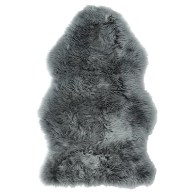 Its a grey ULLERSLEV sheepskin rug, soft and plush, square-shaped, with natural fur texture.