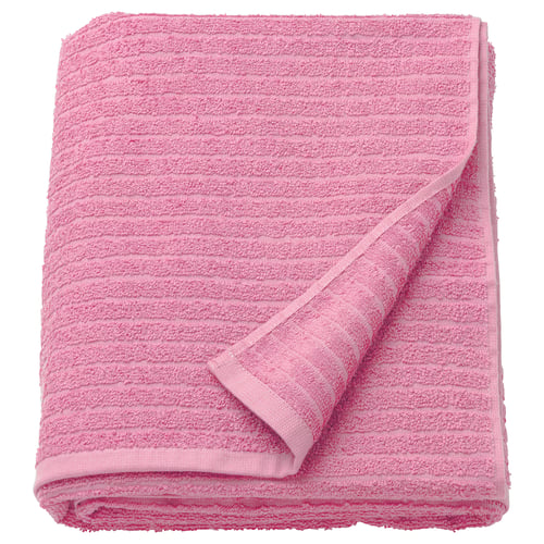 Bright pink VÅGSJÖN towel, folded, terry texture.
