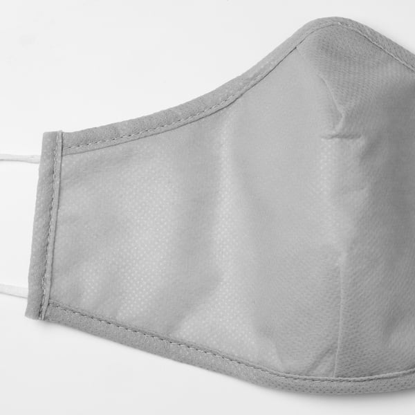 High-quality grey fabric mask with stitched edges and elastic straps.