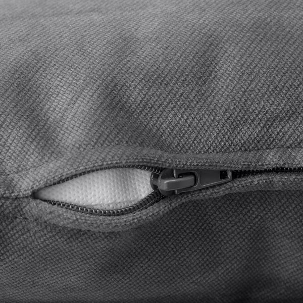Close-up of zip on grey fabric, showcasing smooth, high-quality material.
