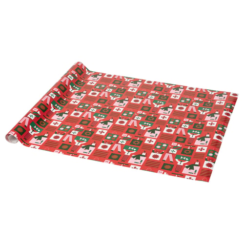 Red gift wrap with christmas patterns. Festive graphics in green, white, and brown on a red background.