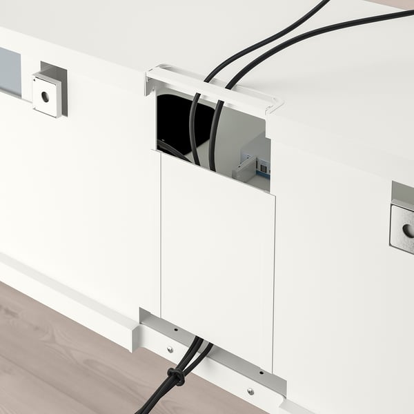 Tv bench with cable management and adjustable feet.