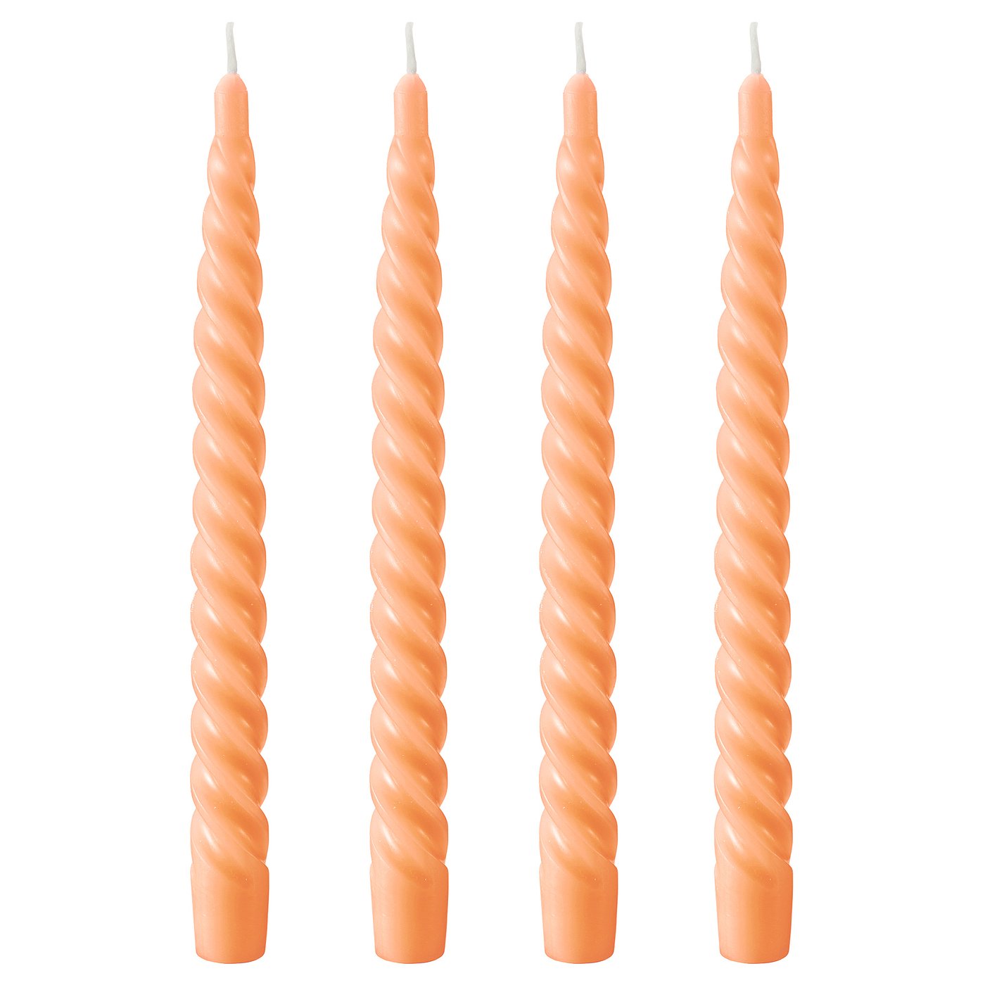 Four twisted orange candles side by side. Made of paraffin and plant-based wax, each with a cotton wick.