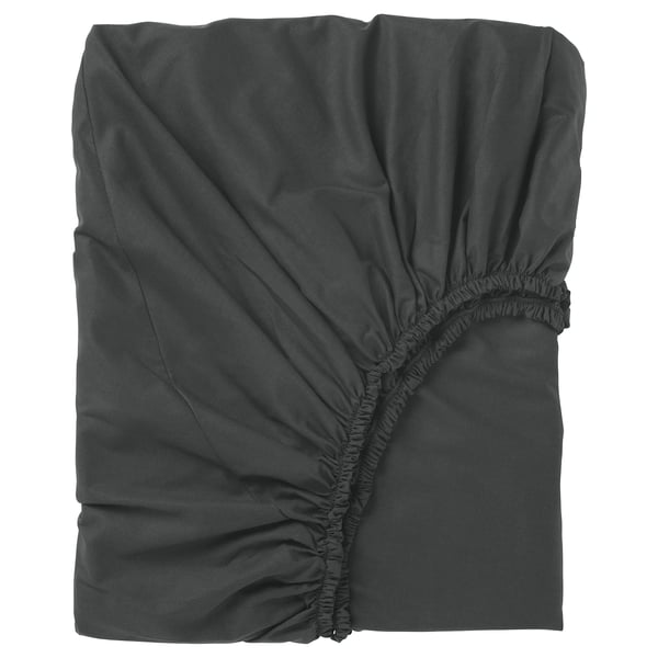 A grey DVALA cotton fitted bed sheet, rectangular with elastic edges for a secure fit.