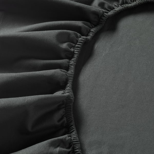 Grey cotton bed sheets with elastic.