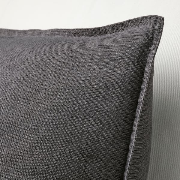 Dark grey cushion cover with soft, textured linen fabric and a hidden zip for easy removal.