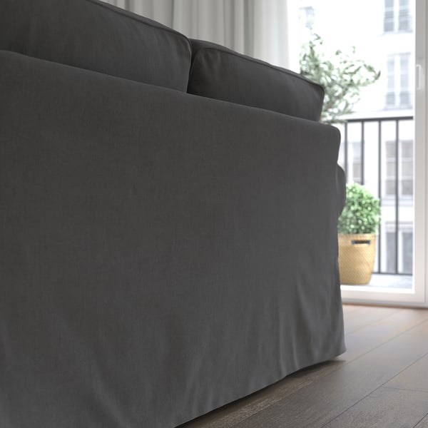 EKTORP sofa by window with plant.