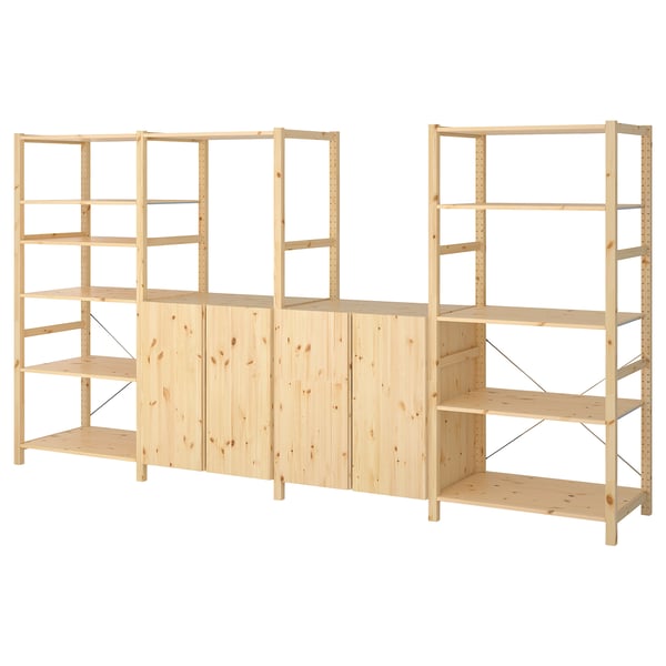 IVAR light wood storage shelves with cabinets.