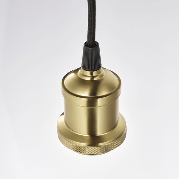 Golden metal lampshade holder with black cord; elegant, high-quality design.