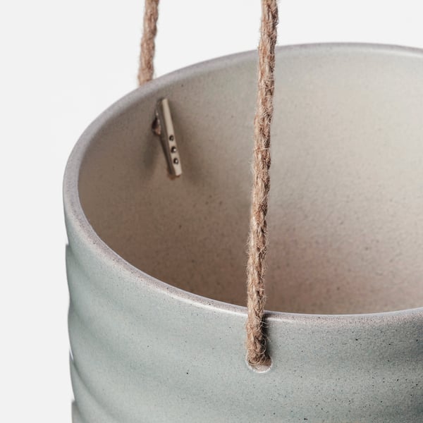 Modern hanging planter with jute rope and metal hook, showcasing grey speckled finish.