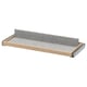 An IKEA KOMPLEMENT pull-out tray in light oak with grey felt lining. It’s rectangular with a sleek design, perfect for organising items.