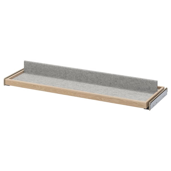 KOMPLEMENT grey felt shelf, light wood frame, single row, wall-mounted storage tray with metal brackets.