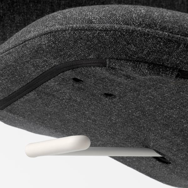 Close-up of a high-quality, upholstered office chairs edge, showcasing premium fabric and stitching details.
