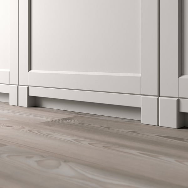 White LERHYTTAN kitchen leg fits metod series, showing part of light grey kitchen base.