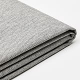 Folded fabric on light surface, smooth texture visible.