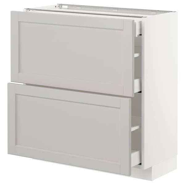 White kitchen cabinet, with two drawers, classic design, part of IKEAs METOD system.