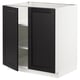 Modern kitchen cabinet, white and black, two doors, square shape, bevelled edges.