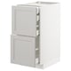 Modern white METOD kitchen cabinet with bevelled edges & pull-out drawers.