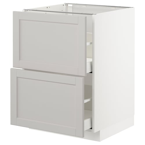 A white ikea METOD kitchen cabinet with multiple drawers. It has a classic design with a smooth, beveled edge finish.