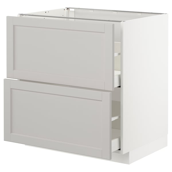 White METOD kitchen cabinet with two drawers and bevelled edges.