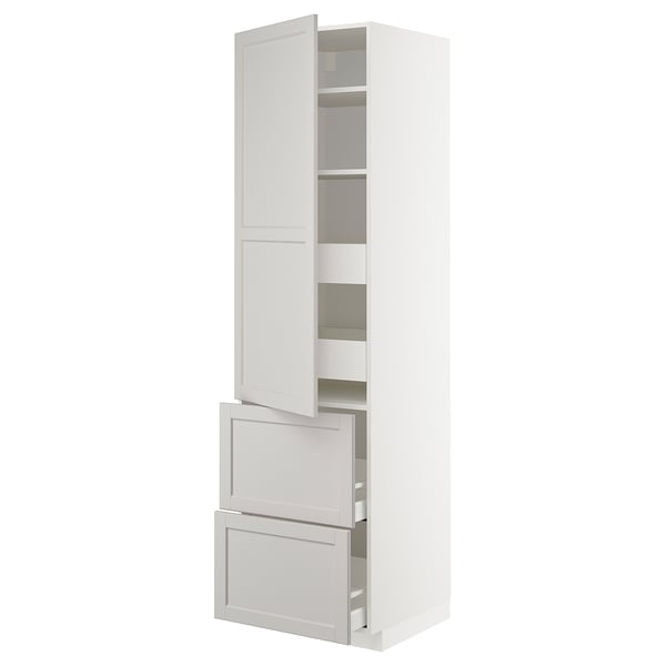 A white METOD kitchen cabinet with light grey lerhyttan fronts, featuring bevelled edges, open doors, and drawers.