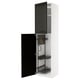 A white METOD kitchen cabinet with black bodbyn doors, featuring pull-out organisers inside.
