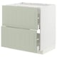This image shows a green ikea METOD kitchen cabinet with two drawers and a white base. It a simple, modern design suitable for a contemporary kitchen.
