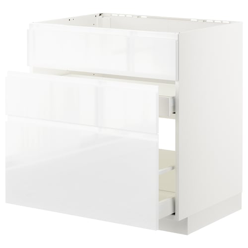 Displays a white METOD kitchen cabinet with a sleek, modern design and smooth drawer faces.