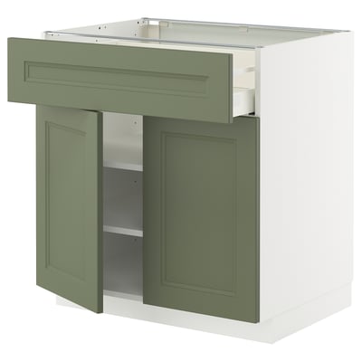 Green and white kitchen cabinet, METOD system. Drawer and shelves, modern design.