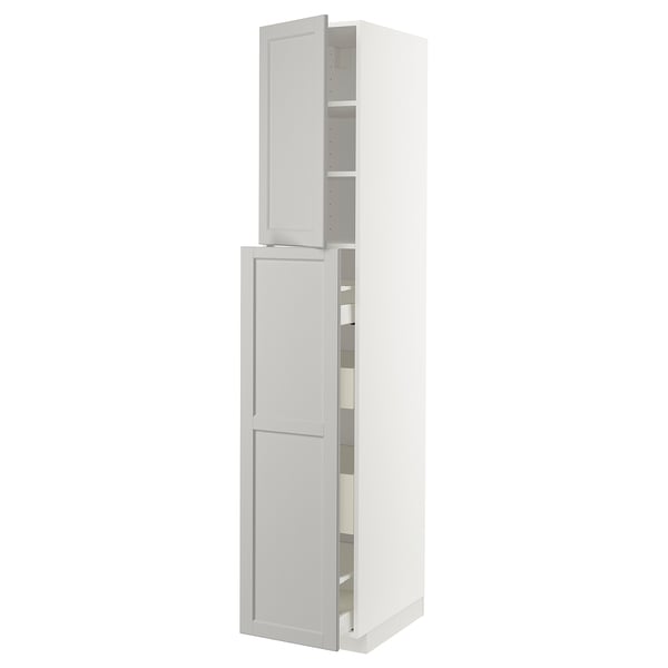 A white METOD kitchen cabinet with two doors and interior shelves.