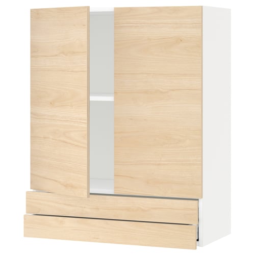 A light wood-colored kitchen cabinet with two doors and a drawer from IKEAs METOD system.