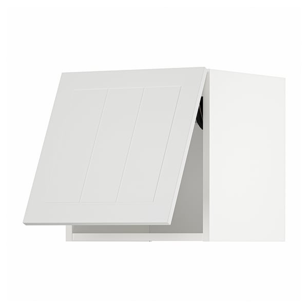 A white METOD kitchen cabinet. Its rectangular, with a flat door and clean lines, offering a modern look.