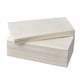 Stack of white paper napkins neatly folded, with a pocket for cutlery.