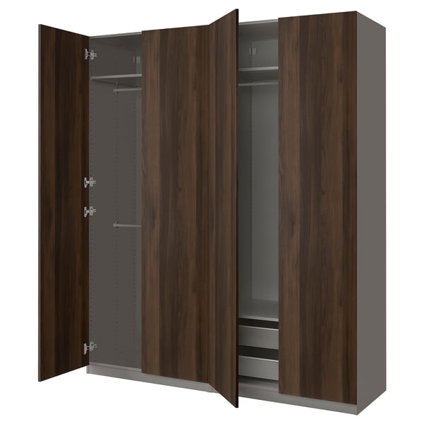 An open dark brown IKEA PAX wardrobe with shelves.