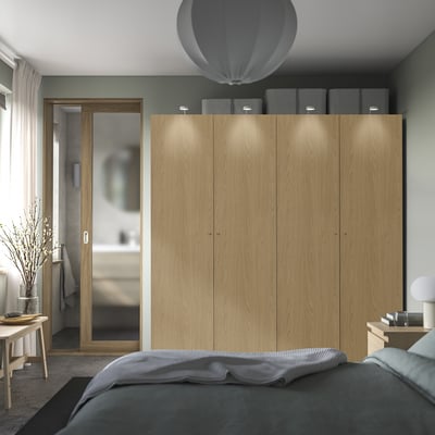 Bedroom with large PAX wardrobe & grey bed linens